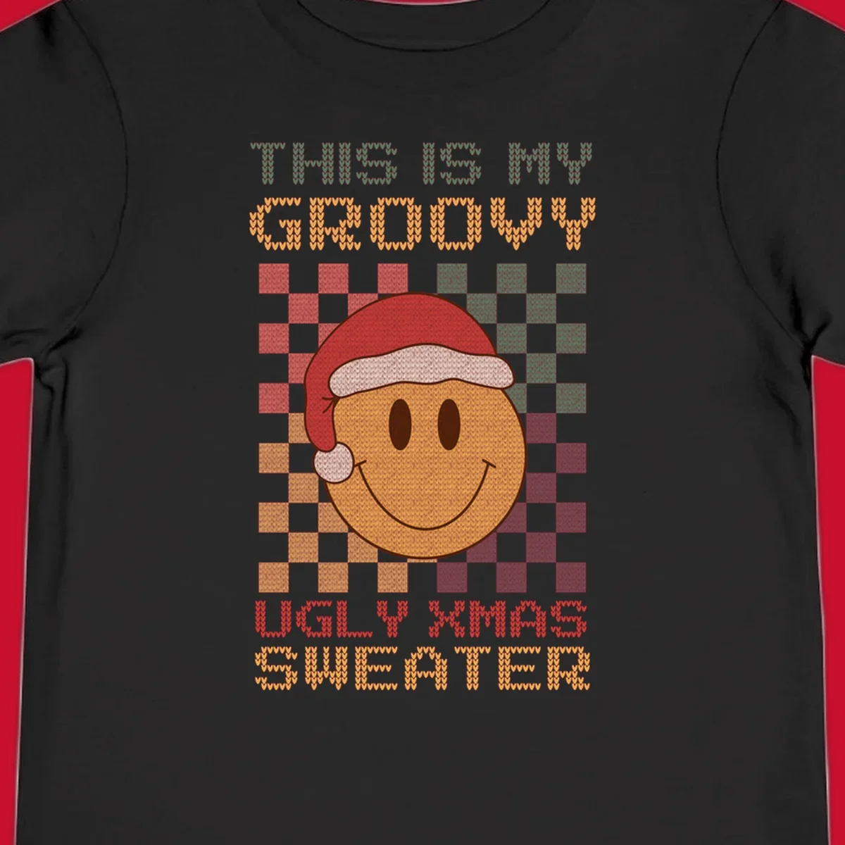 Groovy ugly Christmas sweater design with smiley face, Santa hat, and text.