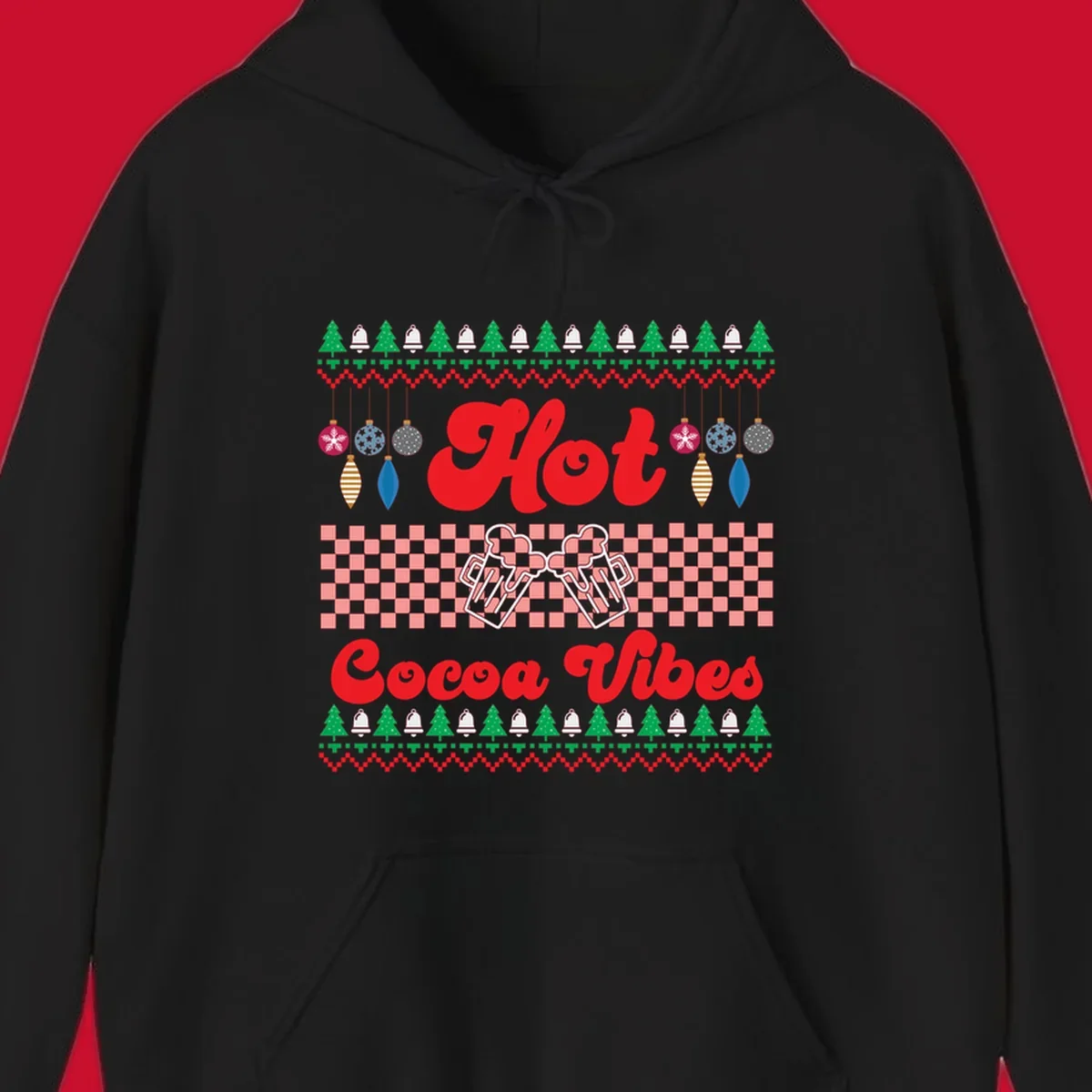 Hot Cocoa Vibes Ugly Christmas sweater design with retro text, Christmas trees, bells, and ornaments.