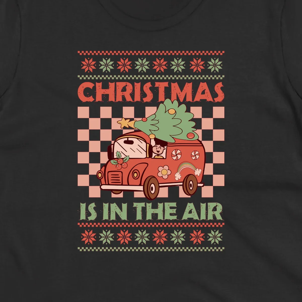 Christmas van with tree on top, text 'Christmas Is In The Air', snowflake borders, checkered pattern.