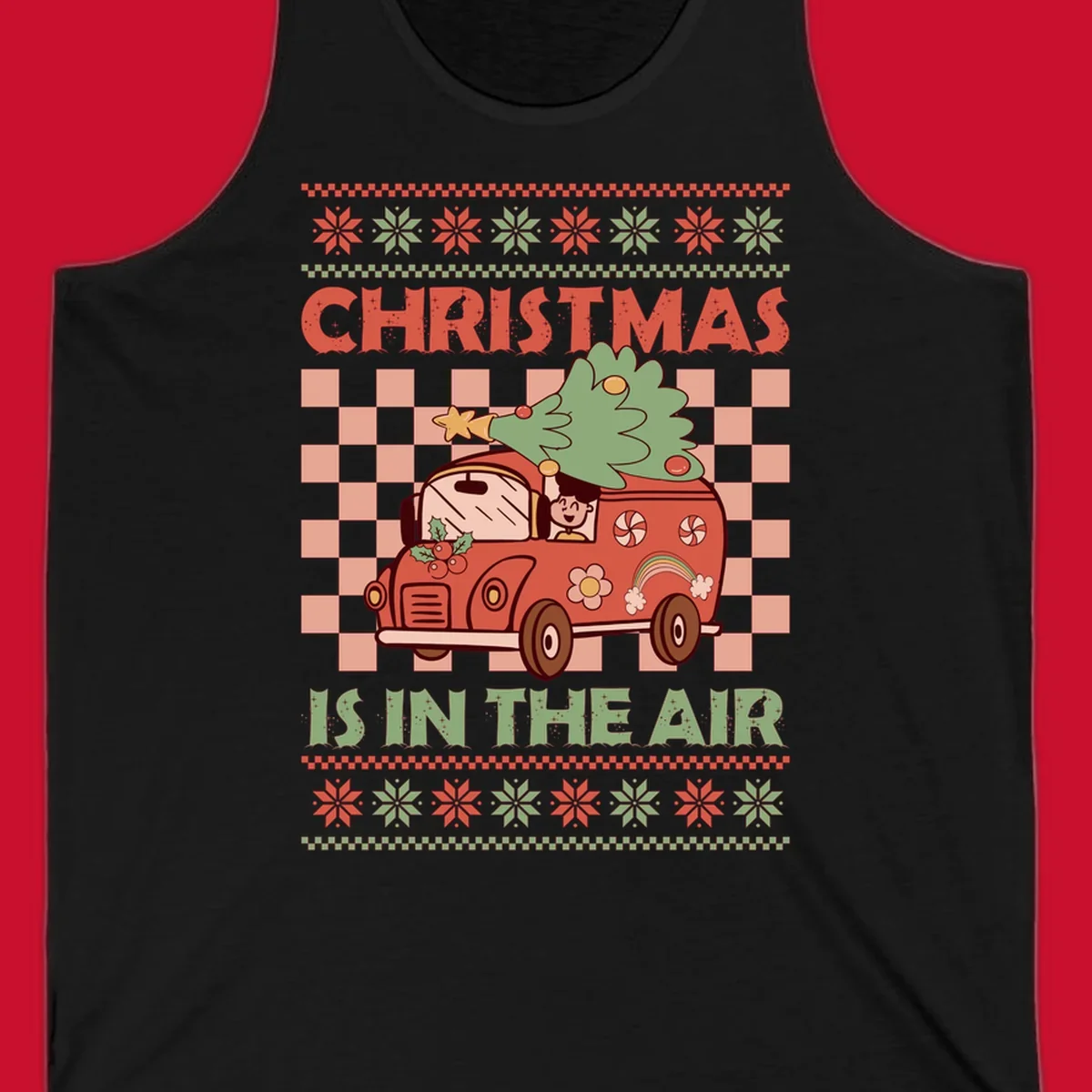 Christmas van with tree on top, text 'Christmas Is In The Air', snowflake borders, checkered pattern.