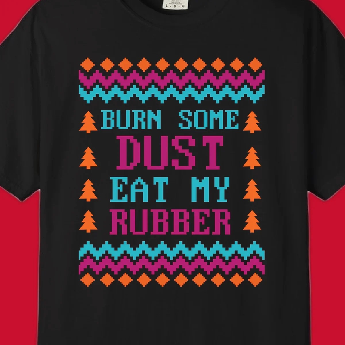 Pixelated text design 'BURN SOME DUST EAT MY RUBBER' with Christmas trees and zig-zag patterns.
