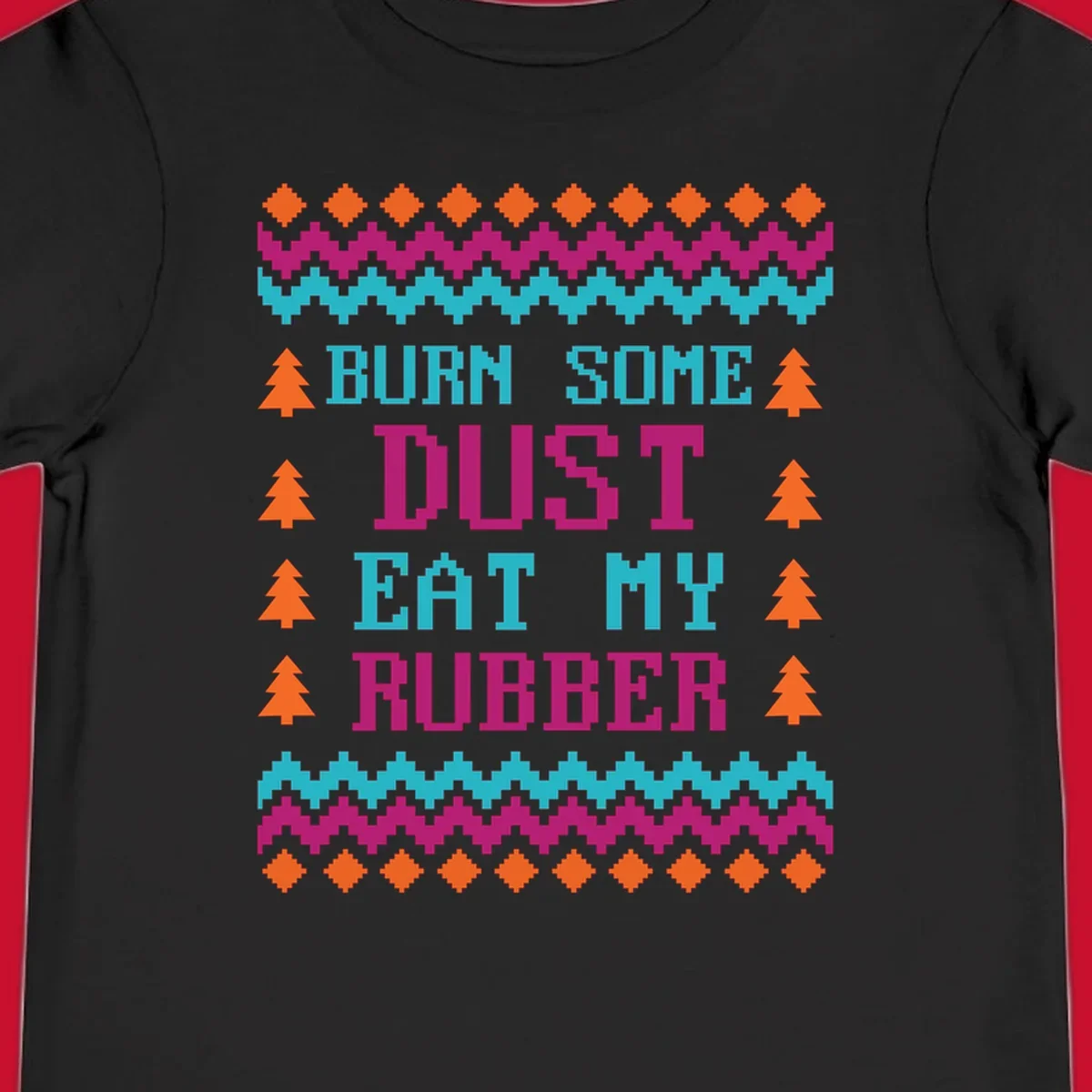 Pixelated text design 'BURN SOME DUST EAT MY RUBBER' with Christmas trees and zig-zag patterns.