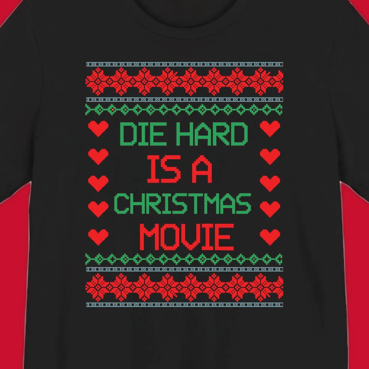 Die Hard is a Christmas Movie pixel art design with red hearts and holiday patterns.