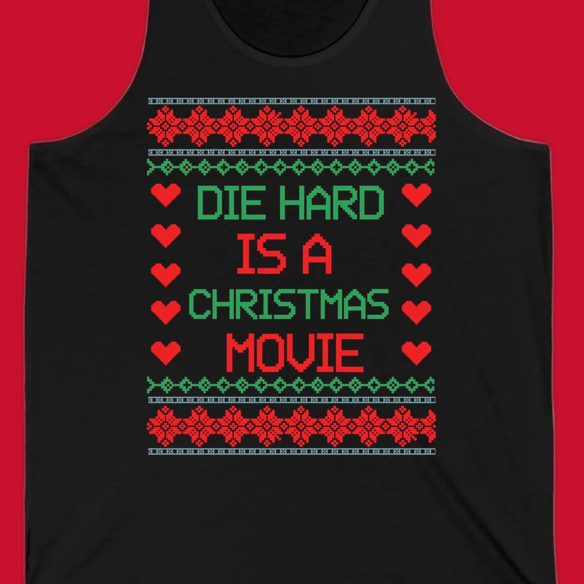Die Hard is a Christmas Movie pixel art design with red hearts and holiday patterns.
