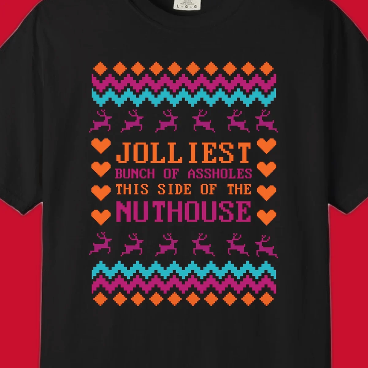 Jolliiest Bunch Of Assholes text with reindeer and heart graphics in an ugly sweater pattern.