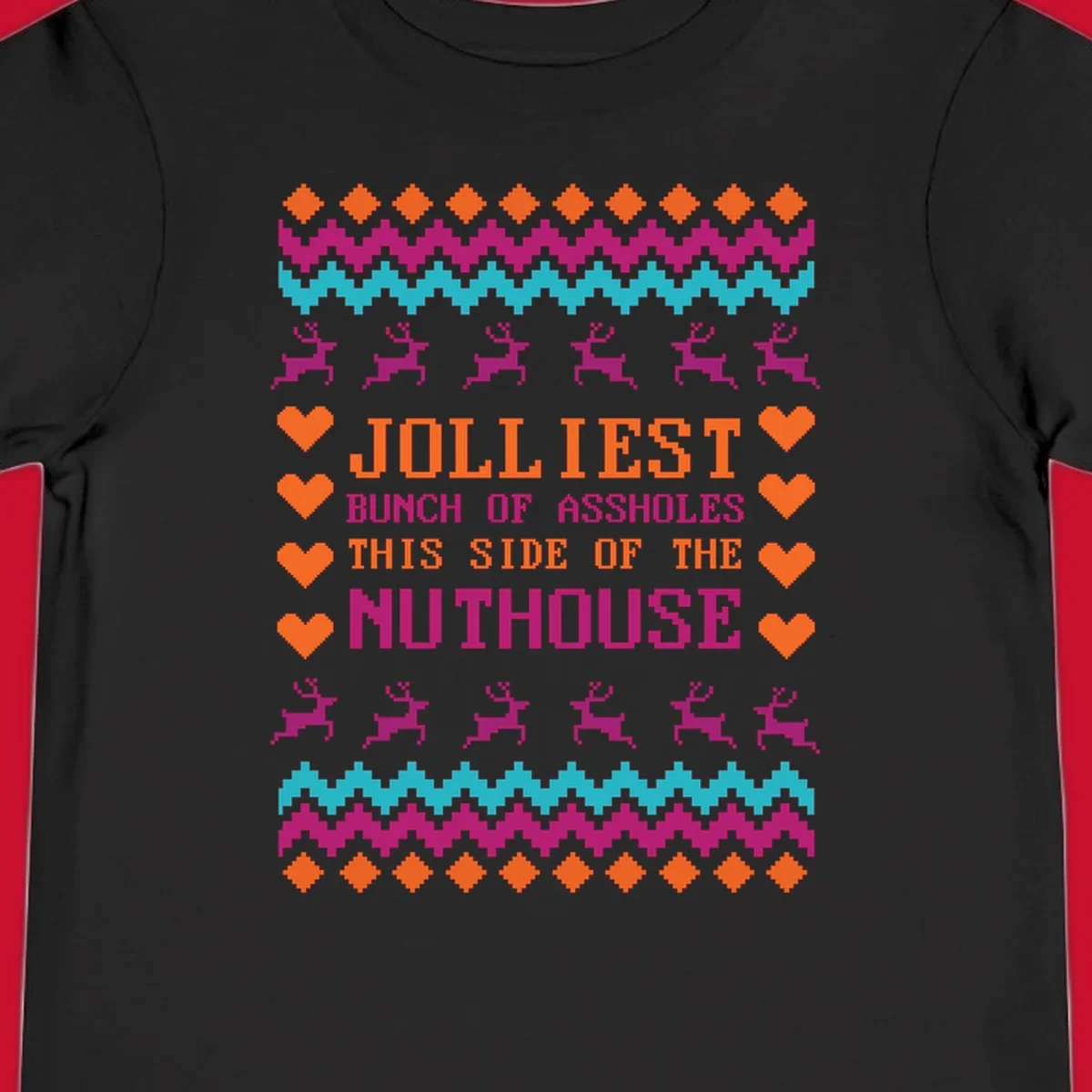 Jolliiest Bunch Of Assholes text with reindeer and heart graphics in an ugly sweater pattern.