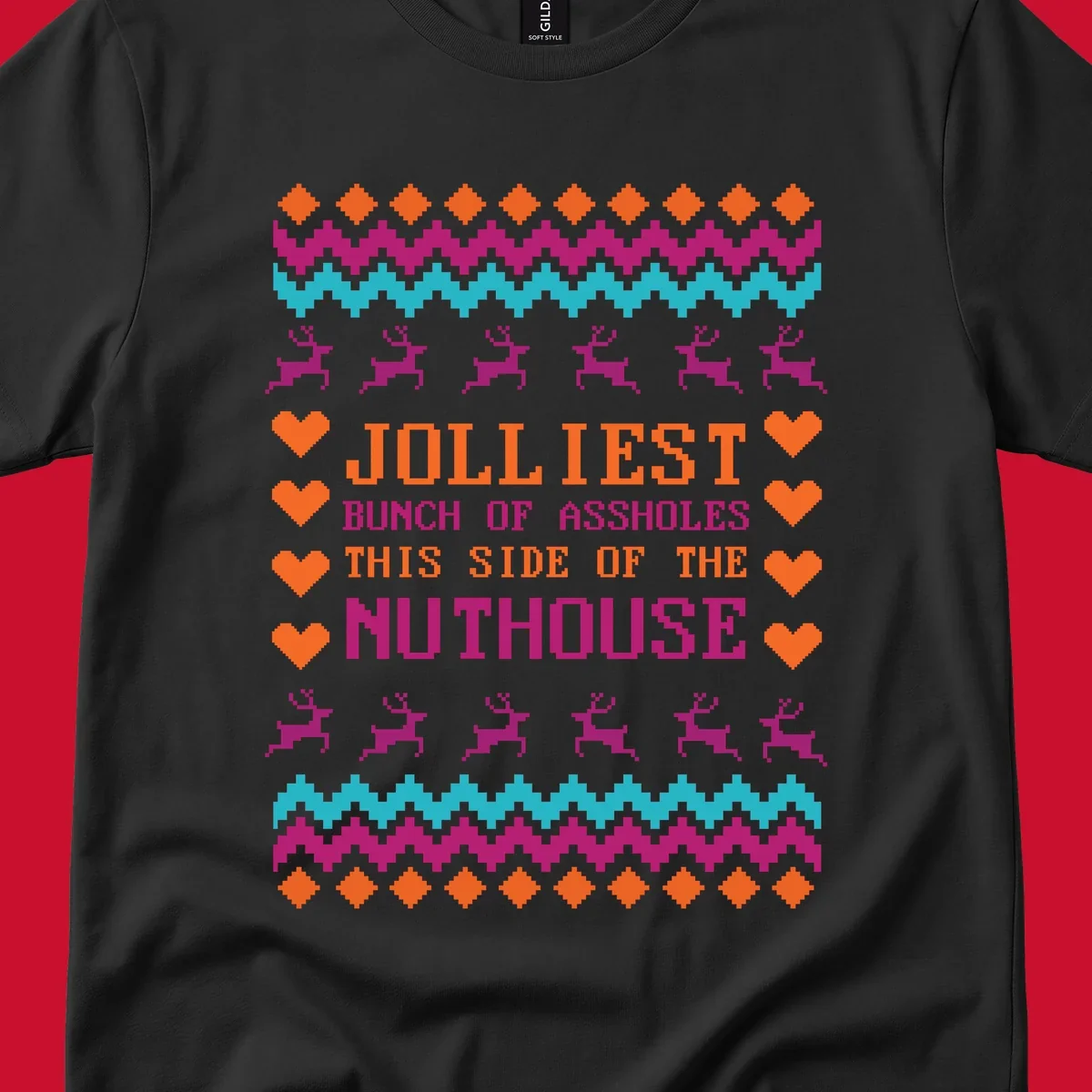 Jolliiest Bunch Of Assholes text with reindeer and heart graphics in an ugly sweater pattern.