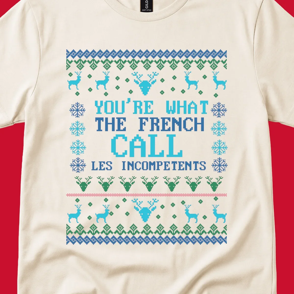 French Call Les Incompetents Ugly Christmas Sweater design with reindeer and snowflakes.