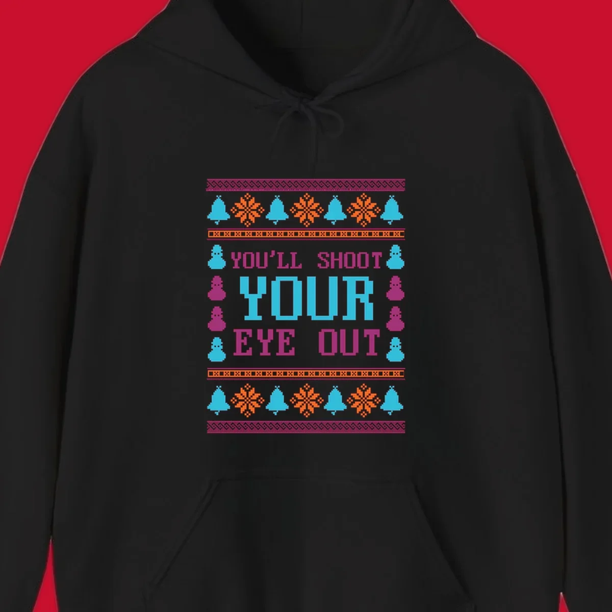 Christmas movie quote "you'll shoot your eye out" with snowflakes, bells, and snowmen.