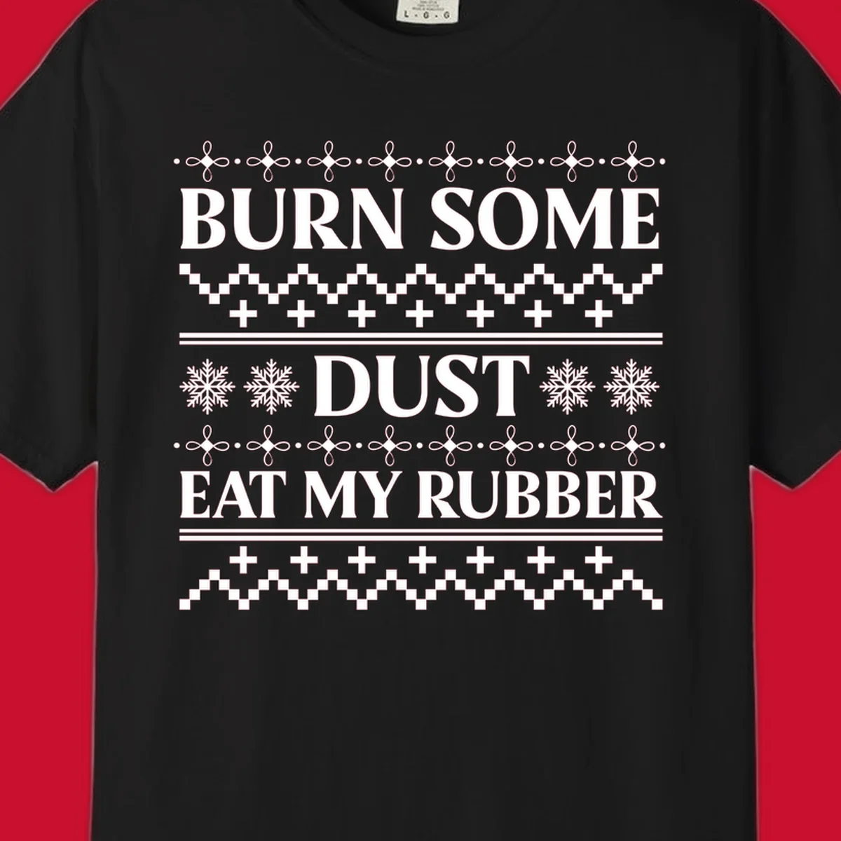 Burn some dust eat my rubber text with snowflakes and geometric patterns, an ugly christmas sweater design.