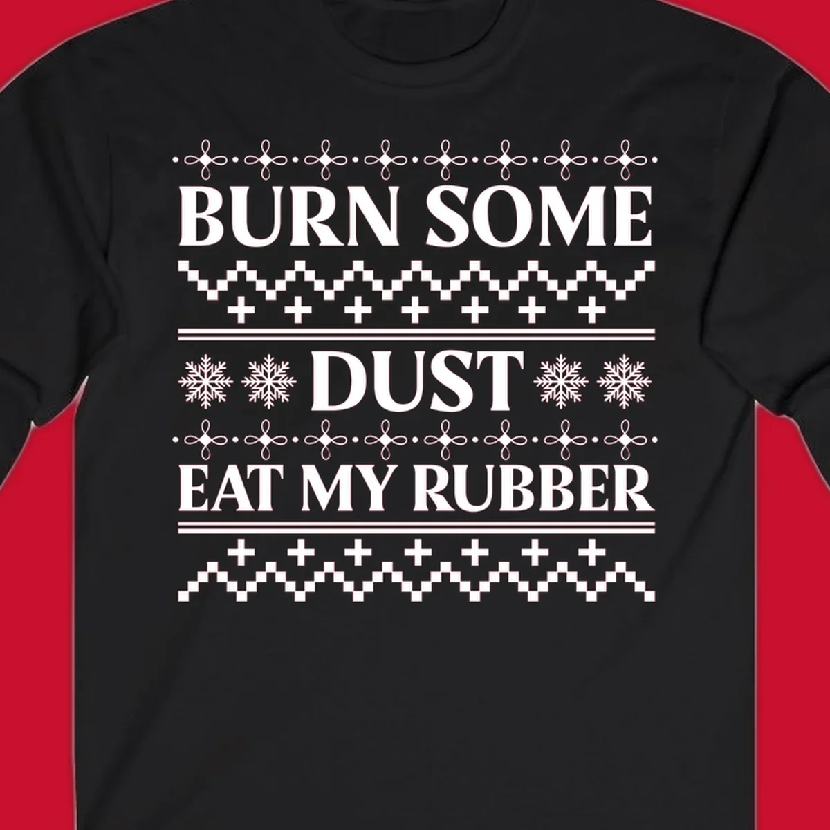 Burn some dust eat my rubber text with snowflakes and geometric patterns, an ugly christmas sweater design.