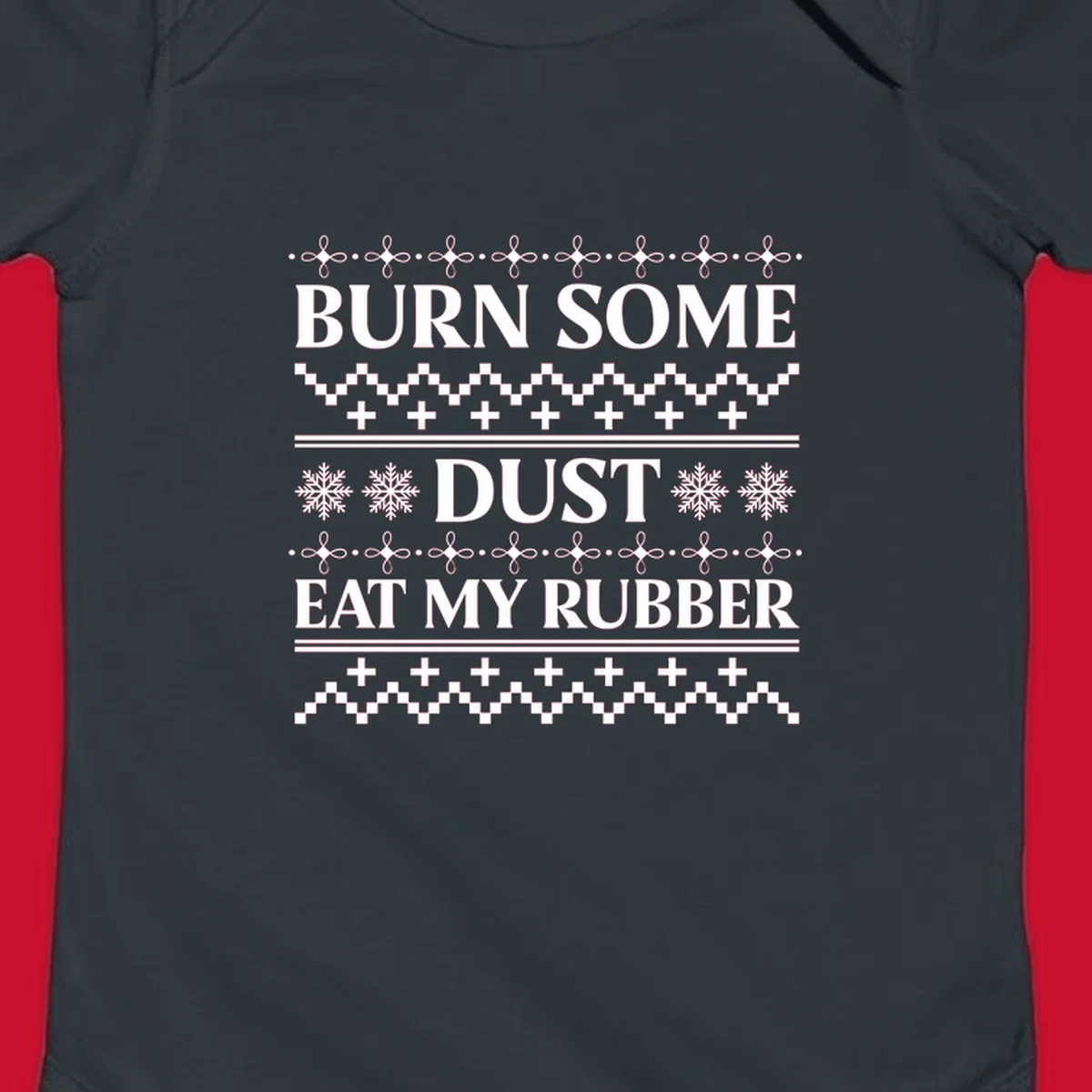 Burn some dust eat my rubber text with snowflakes and geometric patterns, an ugly christmas sweater design.