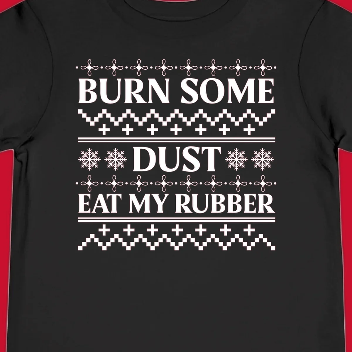 Burn some dust eat my rubber text with snowflakes and geometric patterns, an ugly christmas sweater design.
