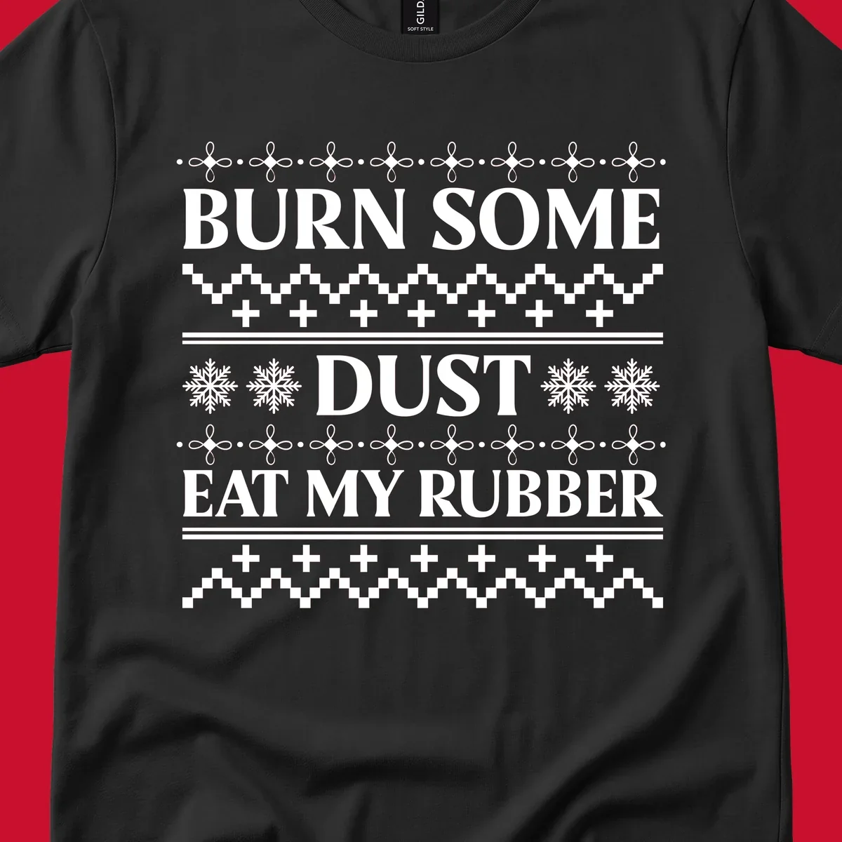 Burn some dust eat my rubber text with snowflakes and geometric patterns, an ugly christmas sweater design.