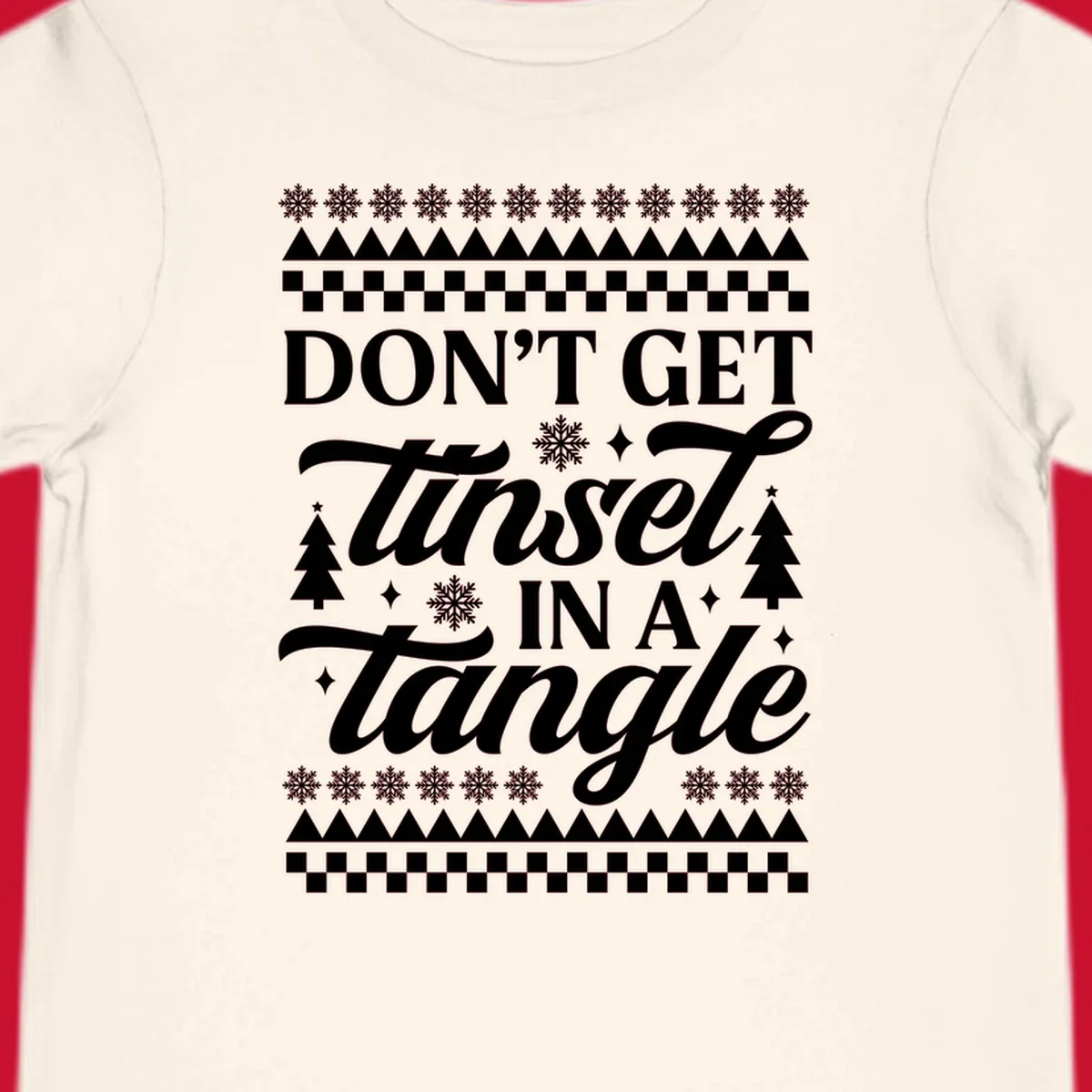 Don't Get Tinsel In A Tangle holiday design with snowflakes and trees.