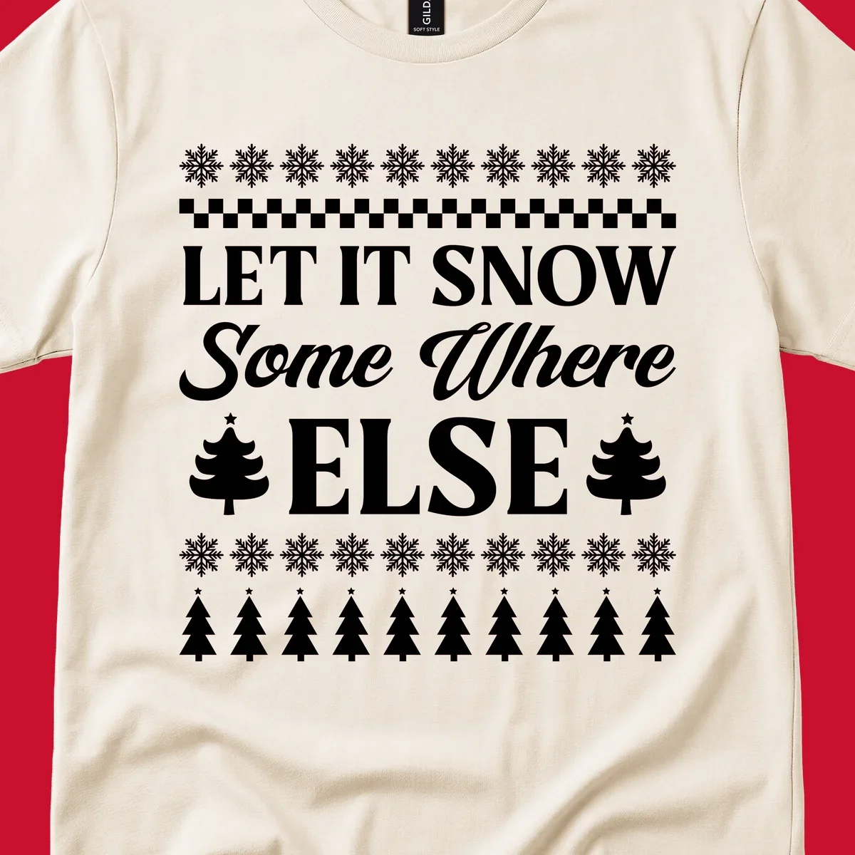 Let it snow somewhere else Christmas design with text and holiday graphics.