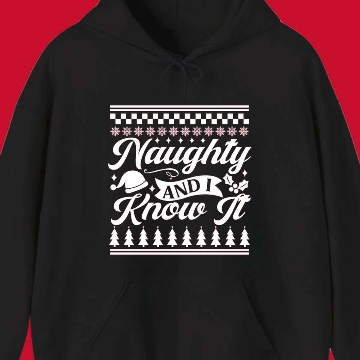 Naughty Christmas saying with Santa hat, snowflakes, and trees.