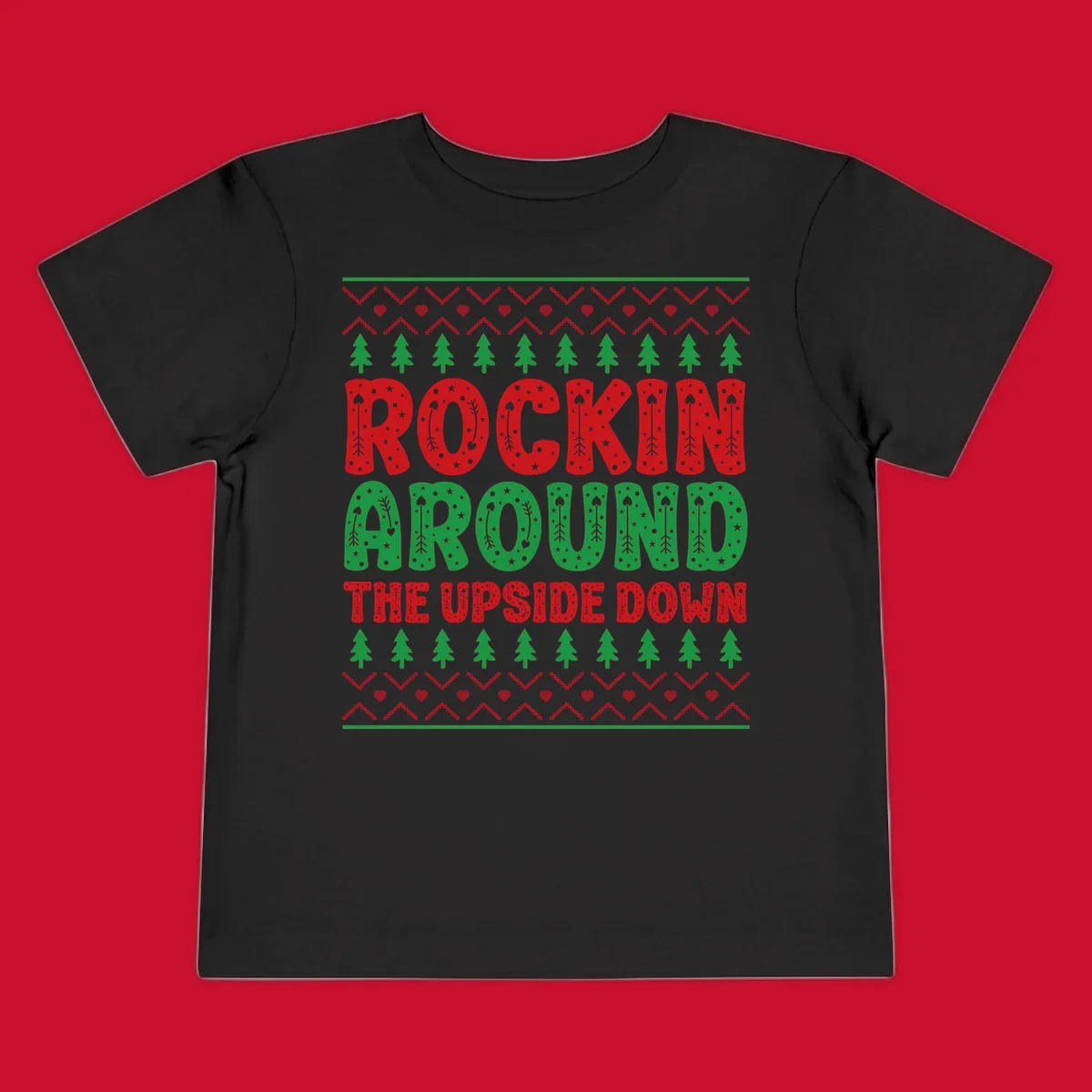 Rockin Around The Upside Down text with Christmas trees and festive patterns.