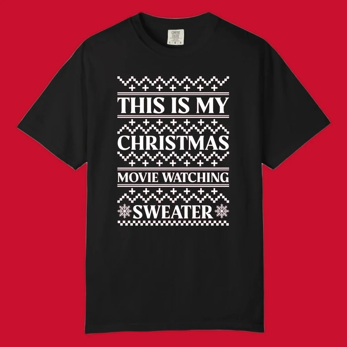 Christmas movie watching sweater with bold text and festive patterns.