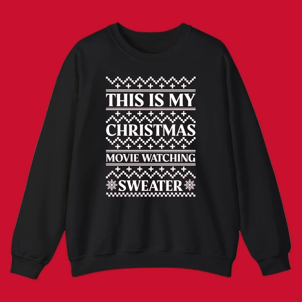 Christmas movie watching sweater with bold text and festive patterns.