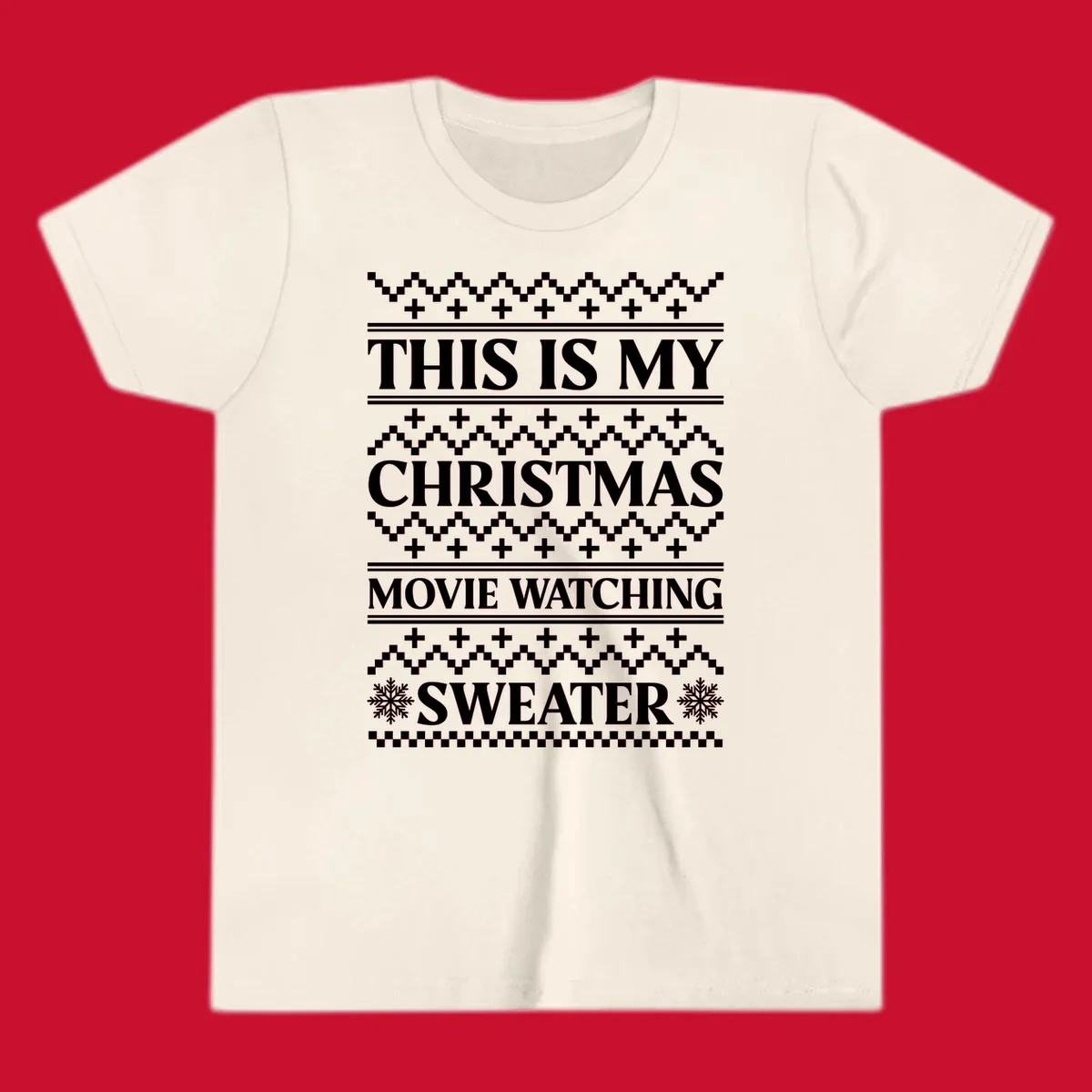 Christmas movie watching sweater with bold text and festive patterns.