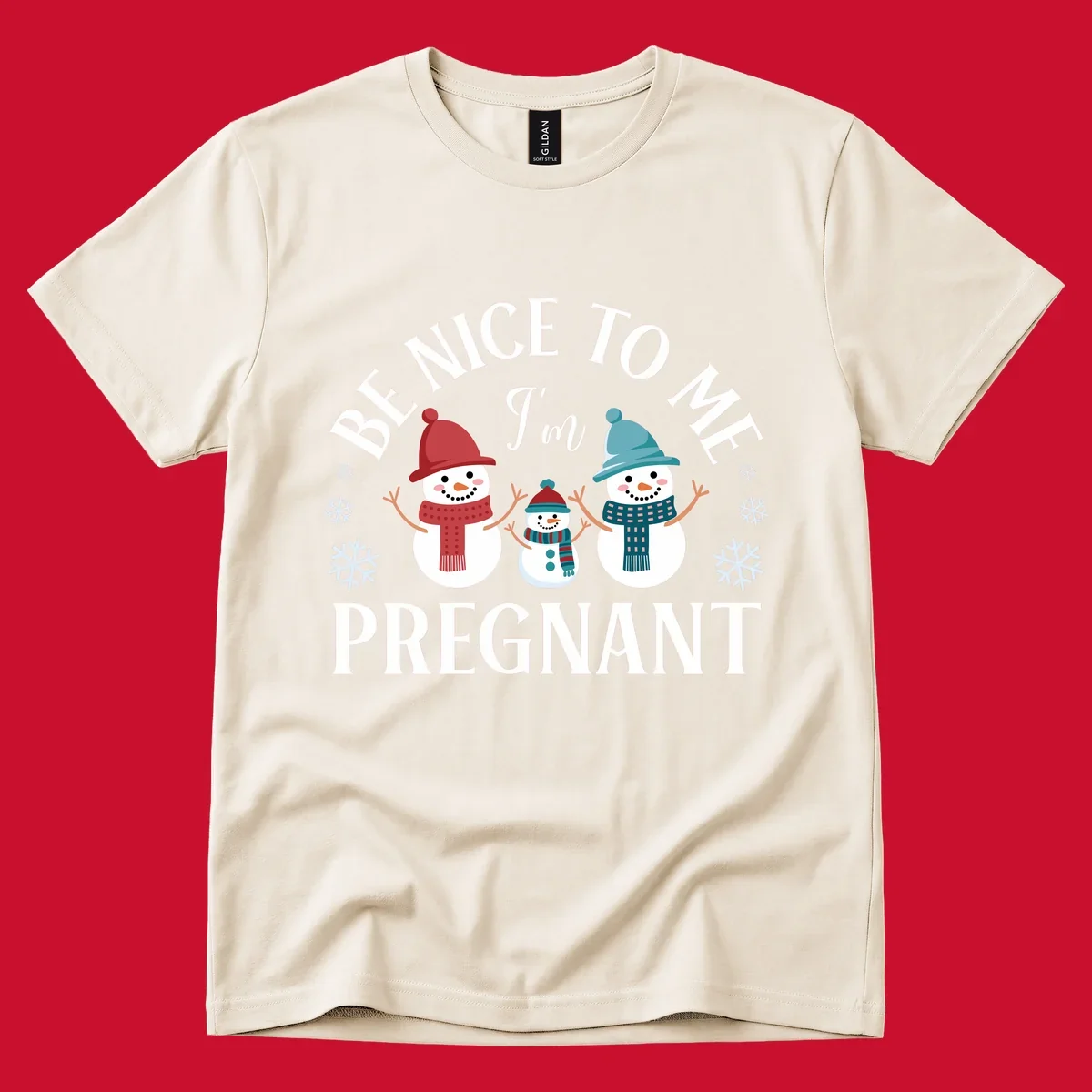 Pregnant snowman family with 'BE NICE TO ME I'm PREGNANT' text and snowflakes.