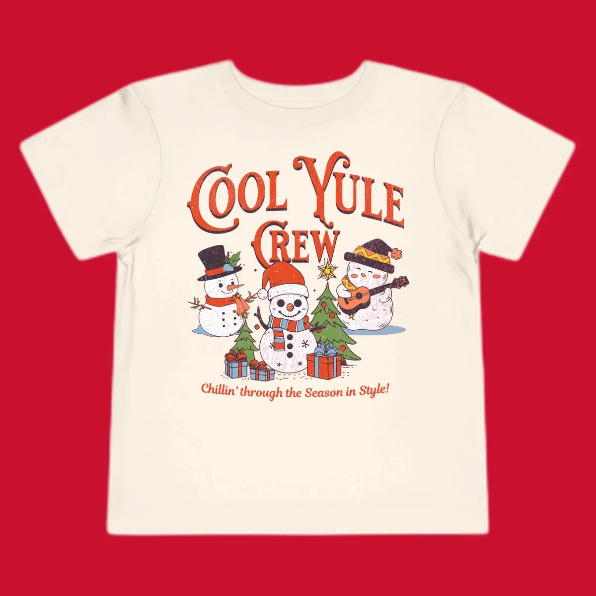 Cool Yule Crew snowmen with guitars and gifts, celebrating the holiday season.