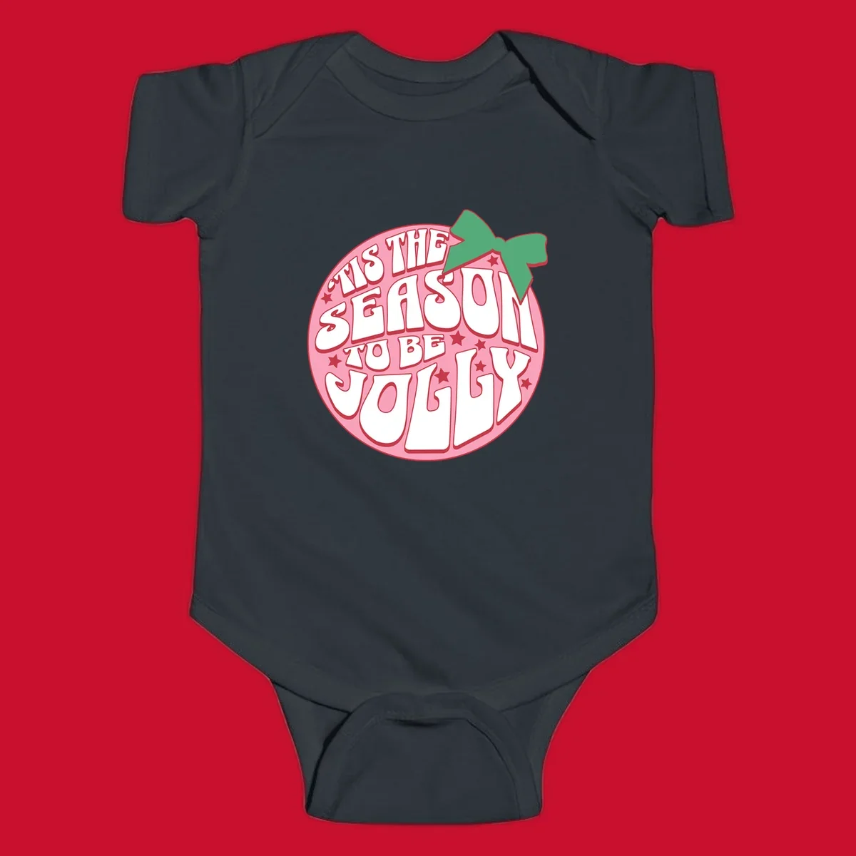 Tis the season to be jolly text with bow and stars, pink oval