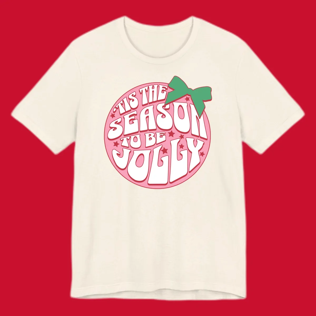 Tis the season to be jolly text with bow and stars, pink oval