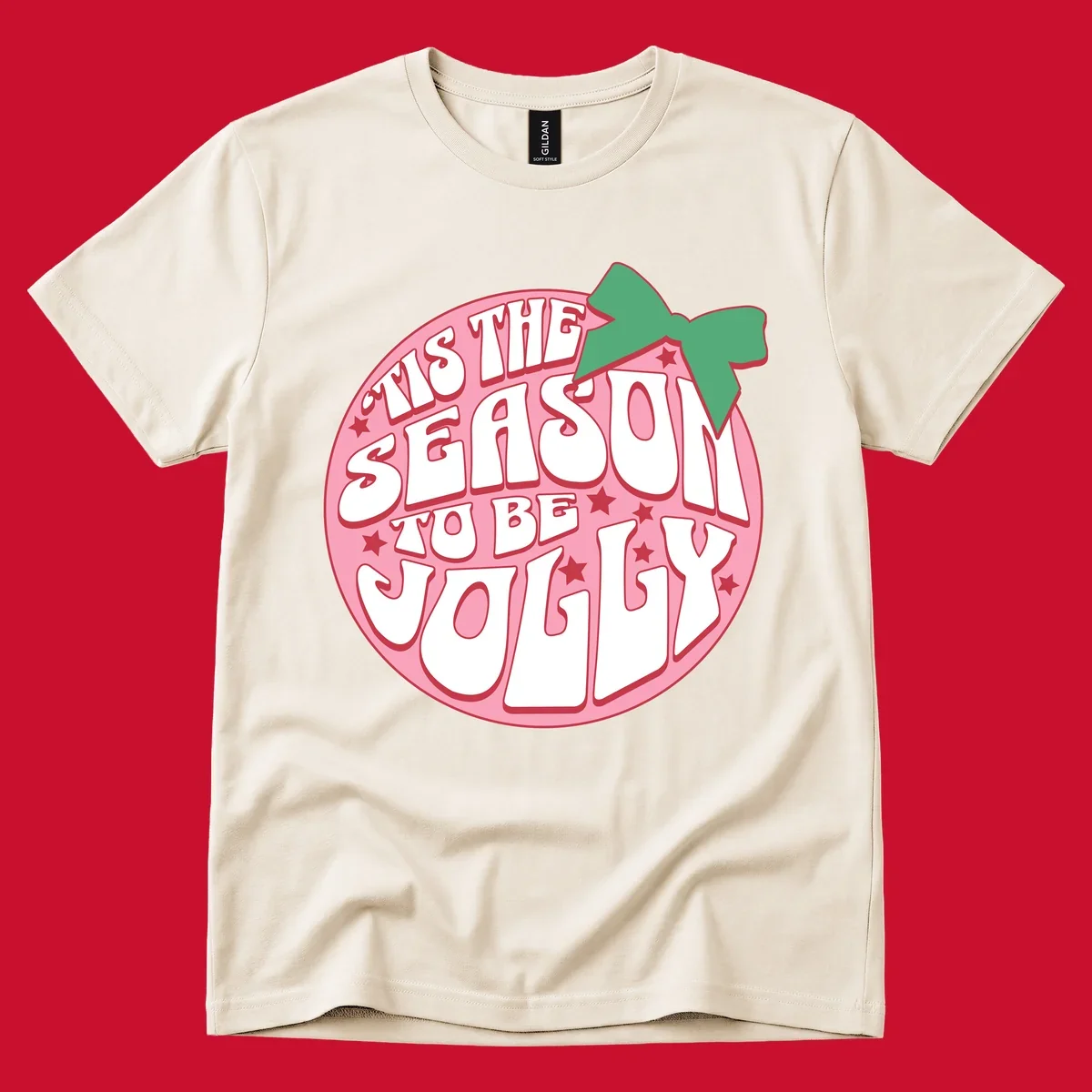 Tis the season to be jolly text with bow and stars, pink oval