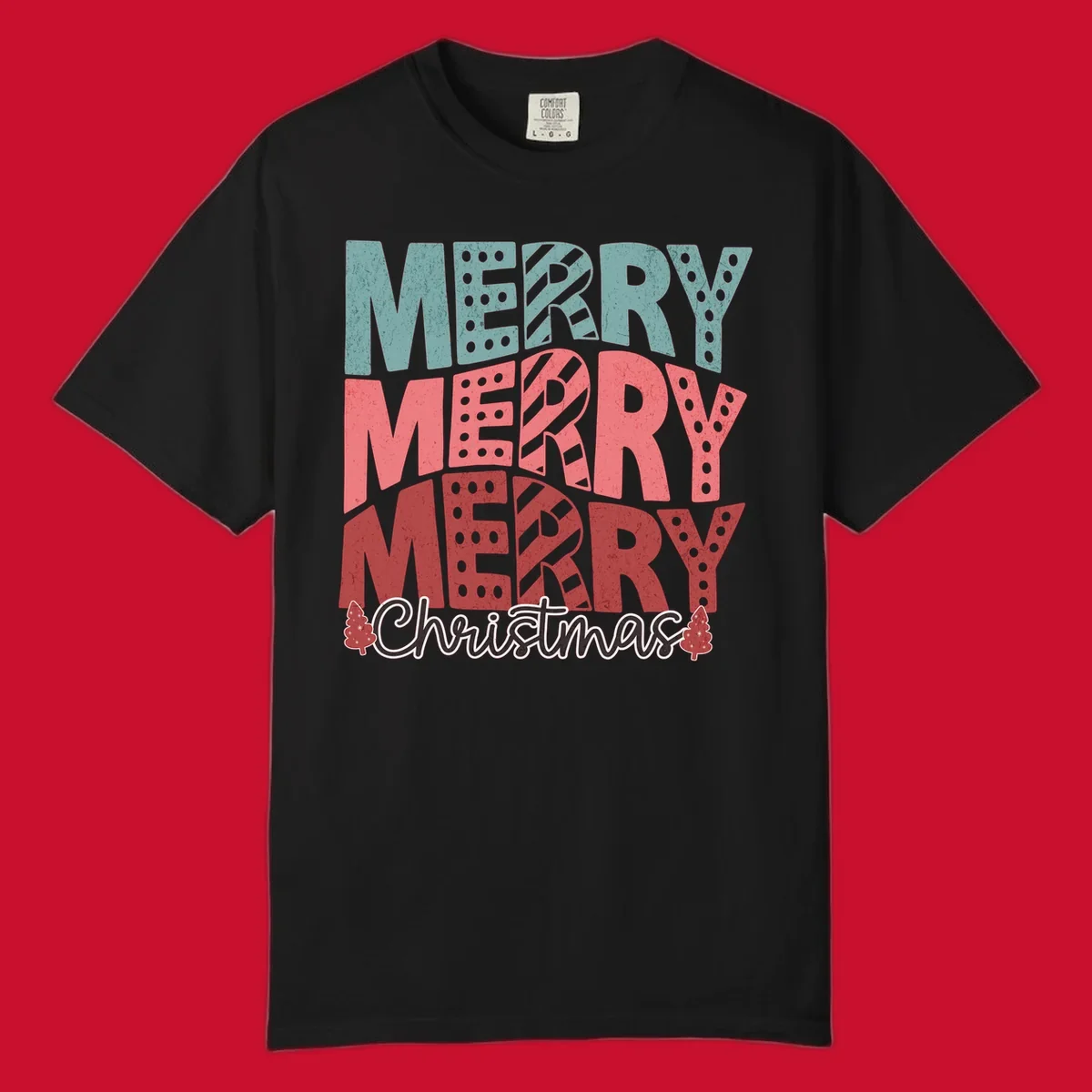 Merry Merry Merry Christmas text design with stacked letters and Christmas trees.