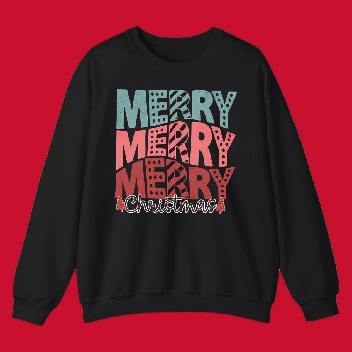 Merry Merry Merry Christmas text design with stacked letters and Christmas trees.