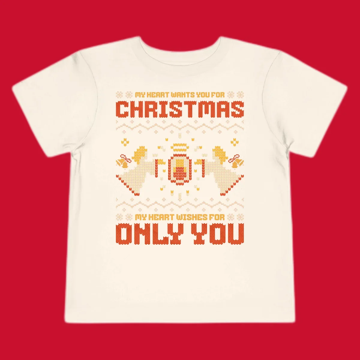 Christmas angel wish design with text and festive motifs.