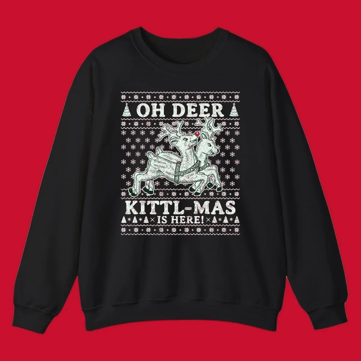 Oh Deer Kittl-Mas reindeer illustration with snowflakes and Christmas trees.