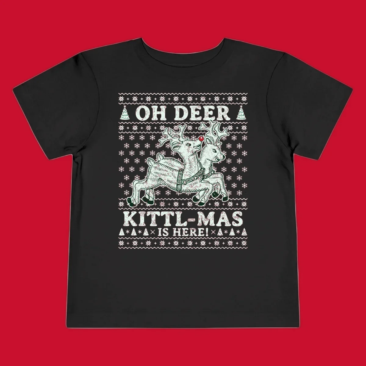 Oh Deer Kittl-Mas reindeer illustration with snowflakes and Christmas trees.