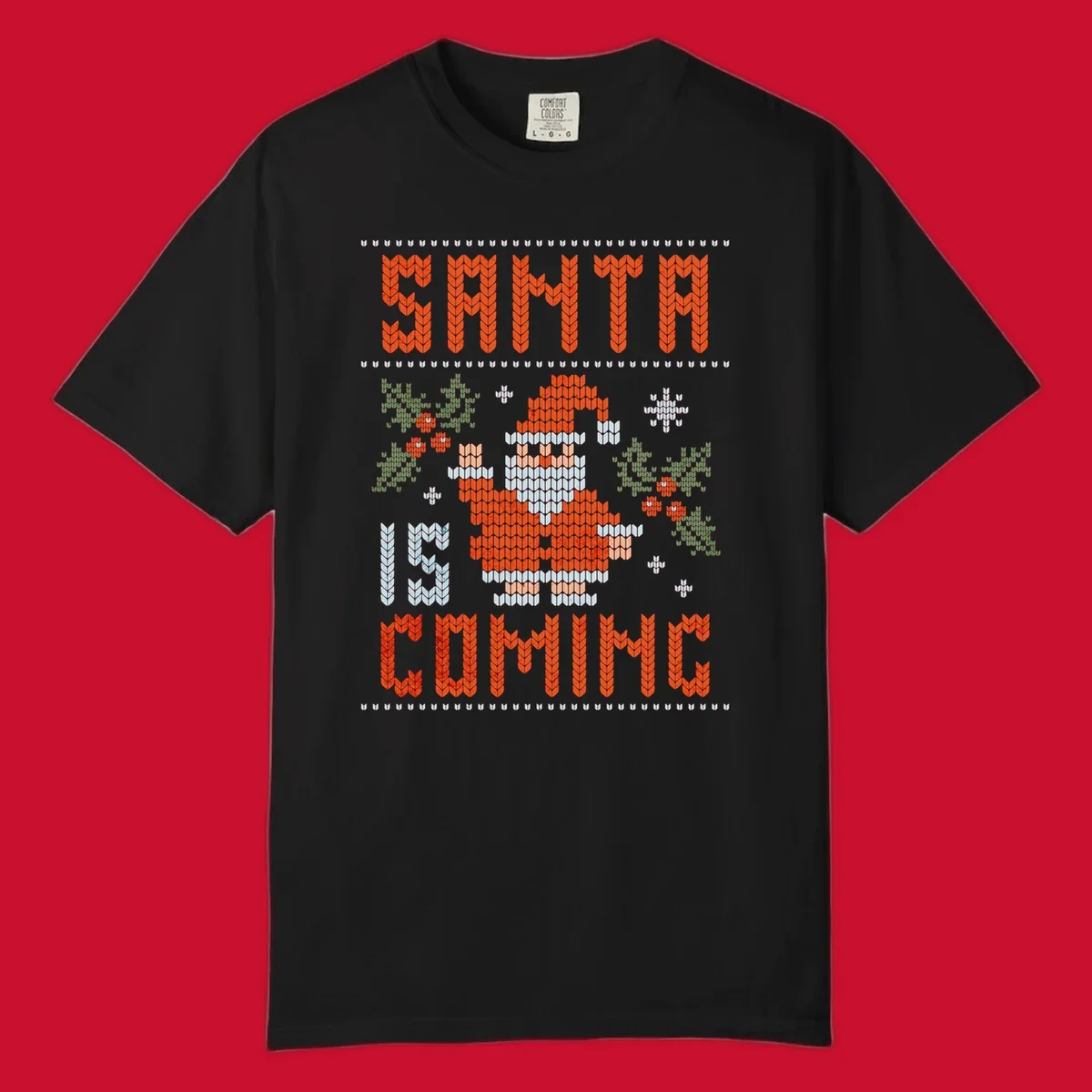 Santa is coming ugly Christmas sweater with pixelated Santa, holly, and snowflakes.