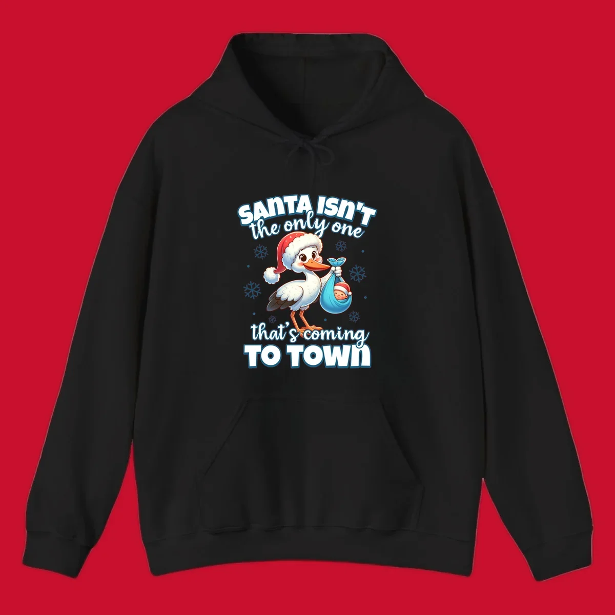 Stork carrying a baby with text "Santa Isn't The Only One That's Coming To Town".