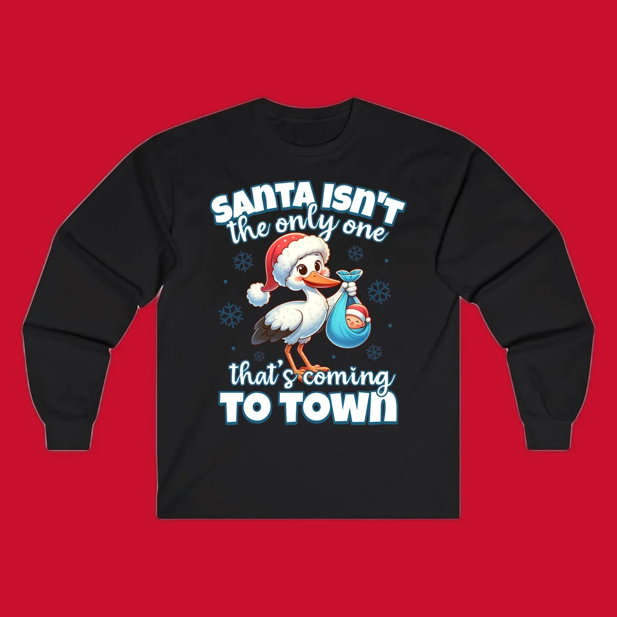 Stork carrying a baby with text "Santa Isn't The Only One That's Coming To Town".
