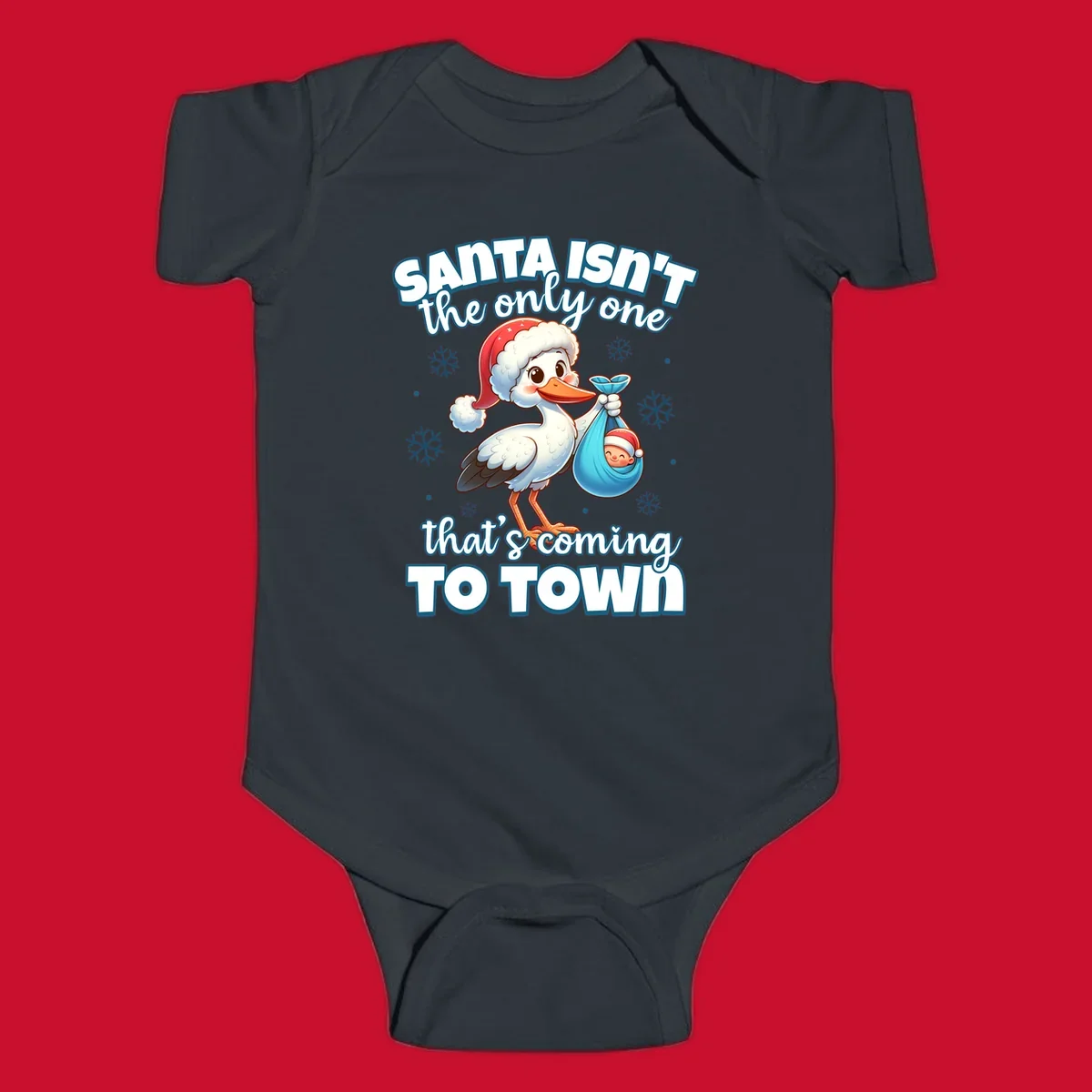 Stork carrying a baby with text "Santa Isn't The Only One That's Coming To Town".