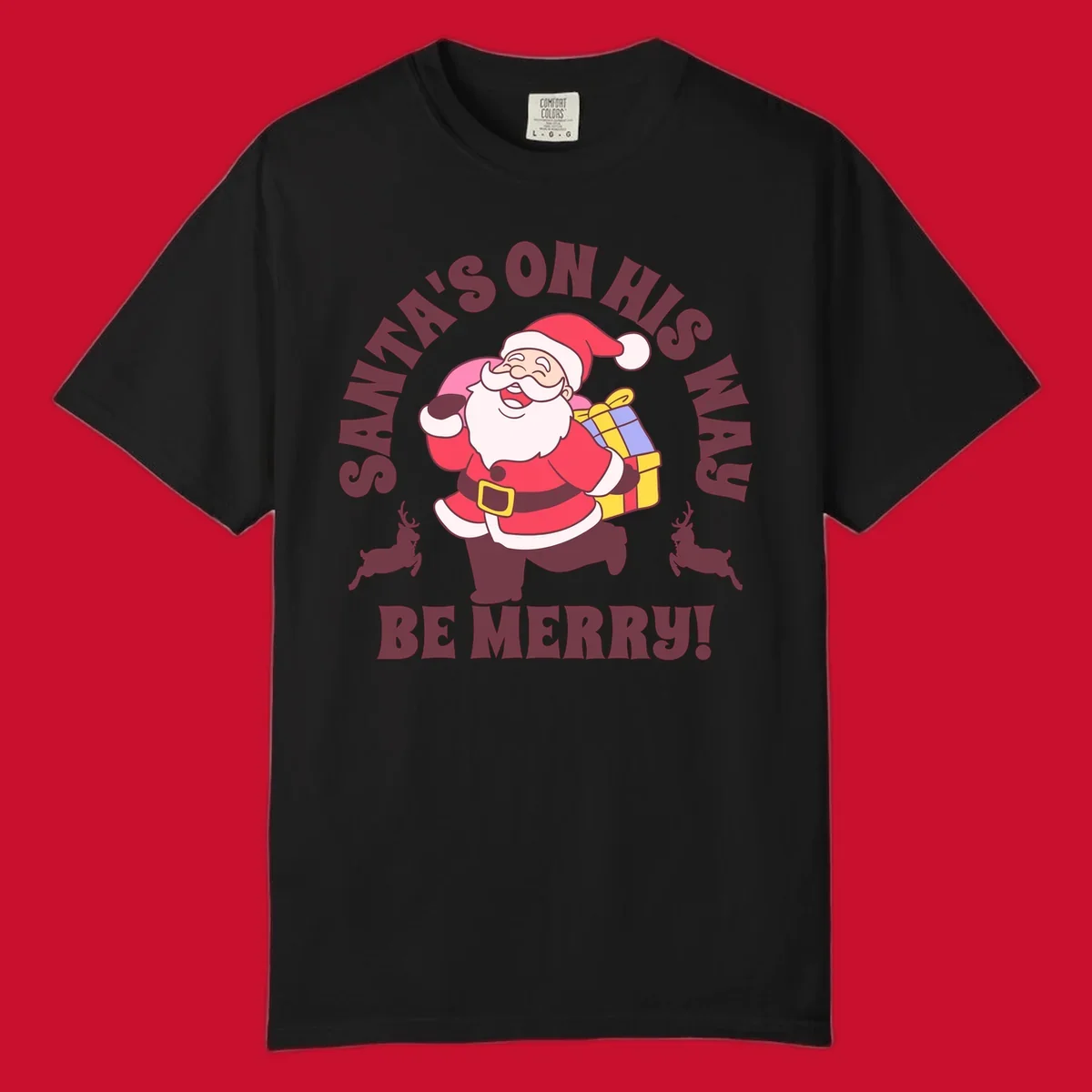 Illustration of Santa Claus running with gifts and reindeer, text reads Santa's on His Way Be Merry.