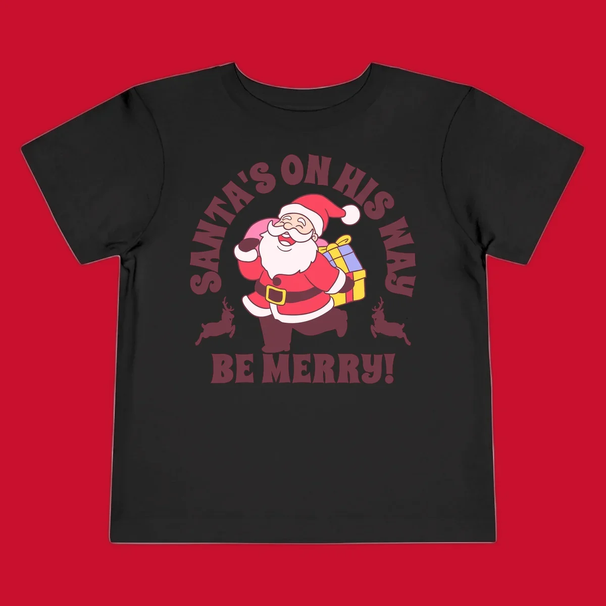 Illustration of Santa Claus running with gifts and reindeer, text reads Santa's on His Way Be Merry.