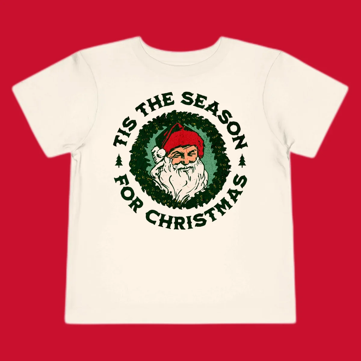 Santa Claus and 'Tis The Season For Christmas text with wreath graphic