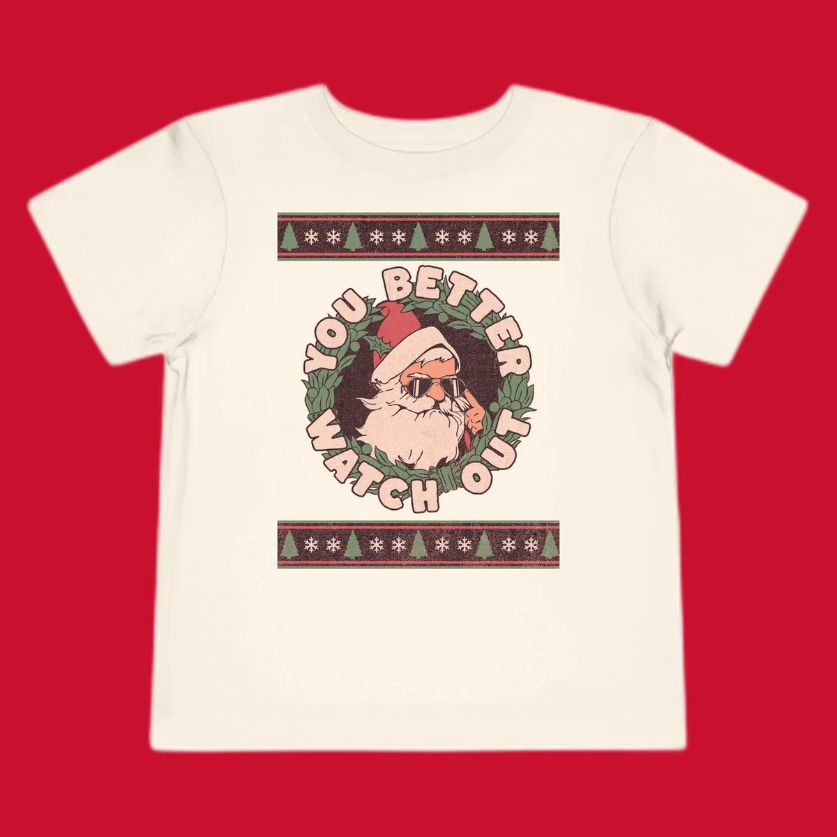 Santa Claus wearing sunglasses in a holly wreath with text, part of the santa-watch-out-christmas design.