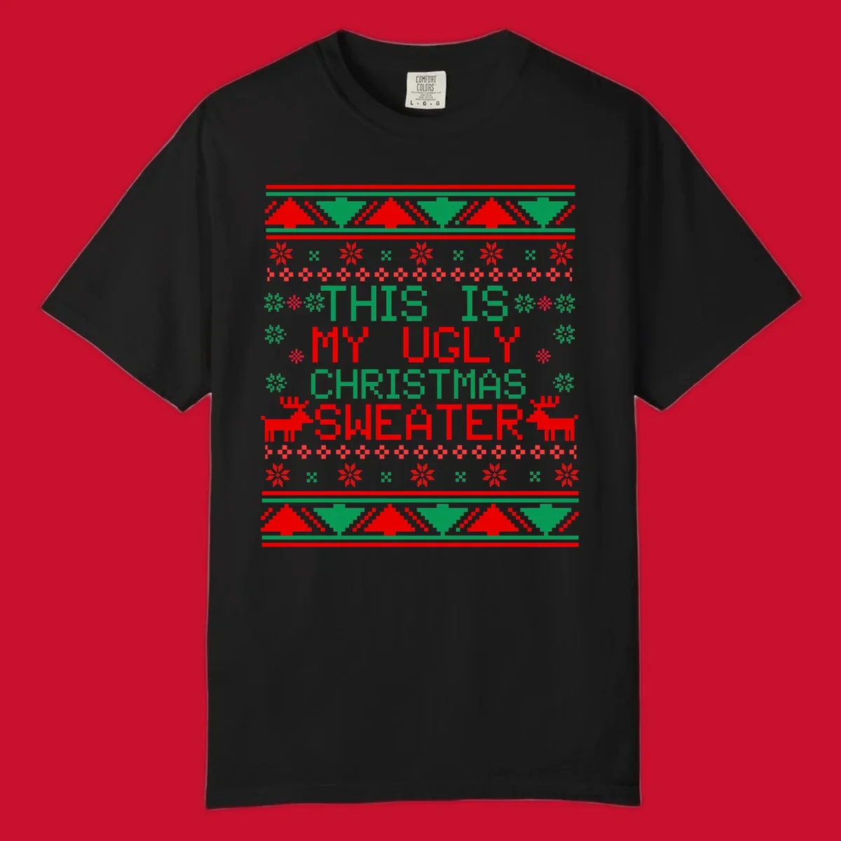 Ugly Christmas sweater statement design with pixelated text, reindeer, and snowflakes.