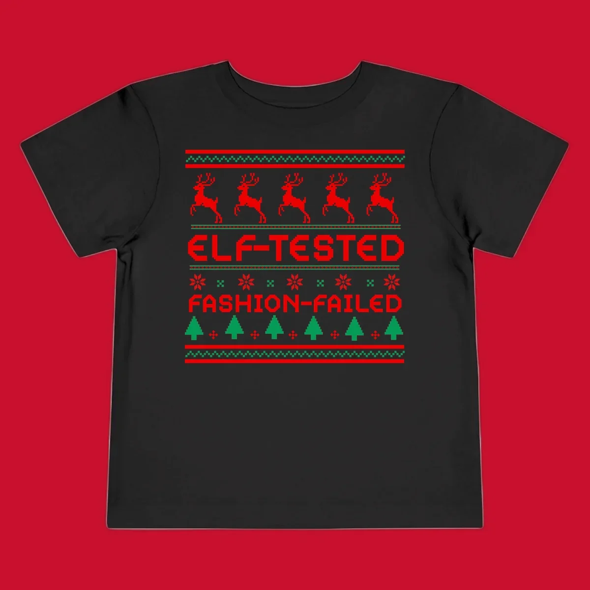 Elf-tested fashion-failed ugly christmas design with reindeer and trees.
