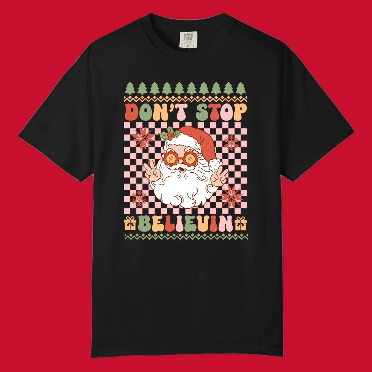 Retro Santa Claus with peace signs and sunglasses, text 'DON'T STOP BELIEVIN''.