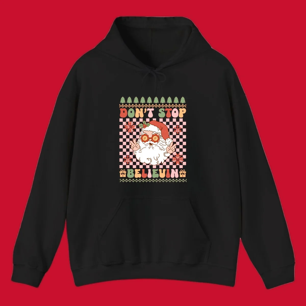 Retro Santa Claus with peace signs and sunglasses, text 'DON'T STOP BELIEVIN''.