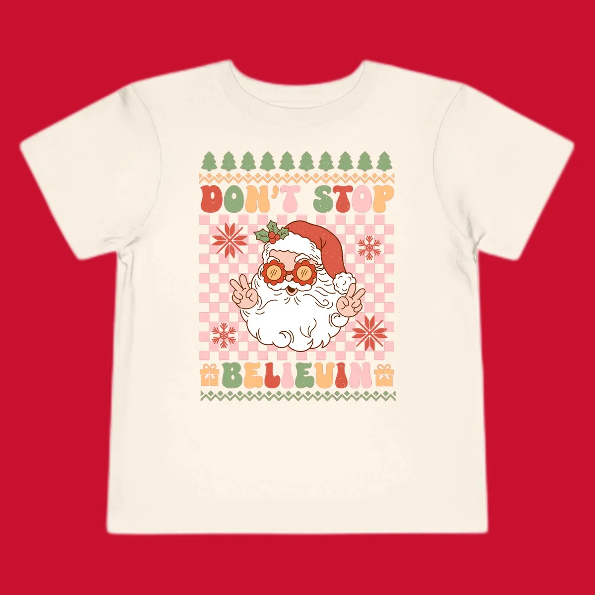 Retro Santa Claus with peace signs and sunglasses, text 'DON'T STOP BELIEVIN''.