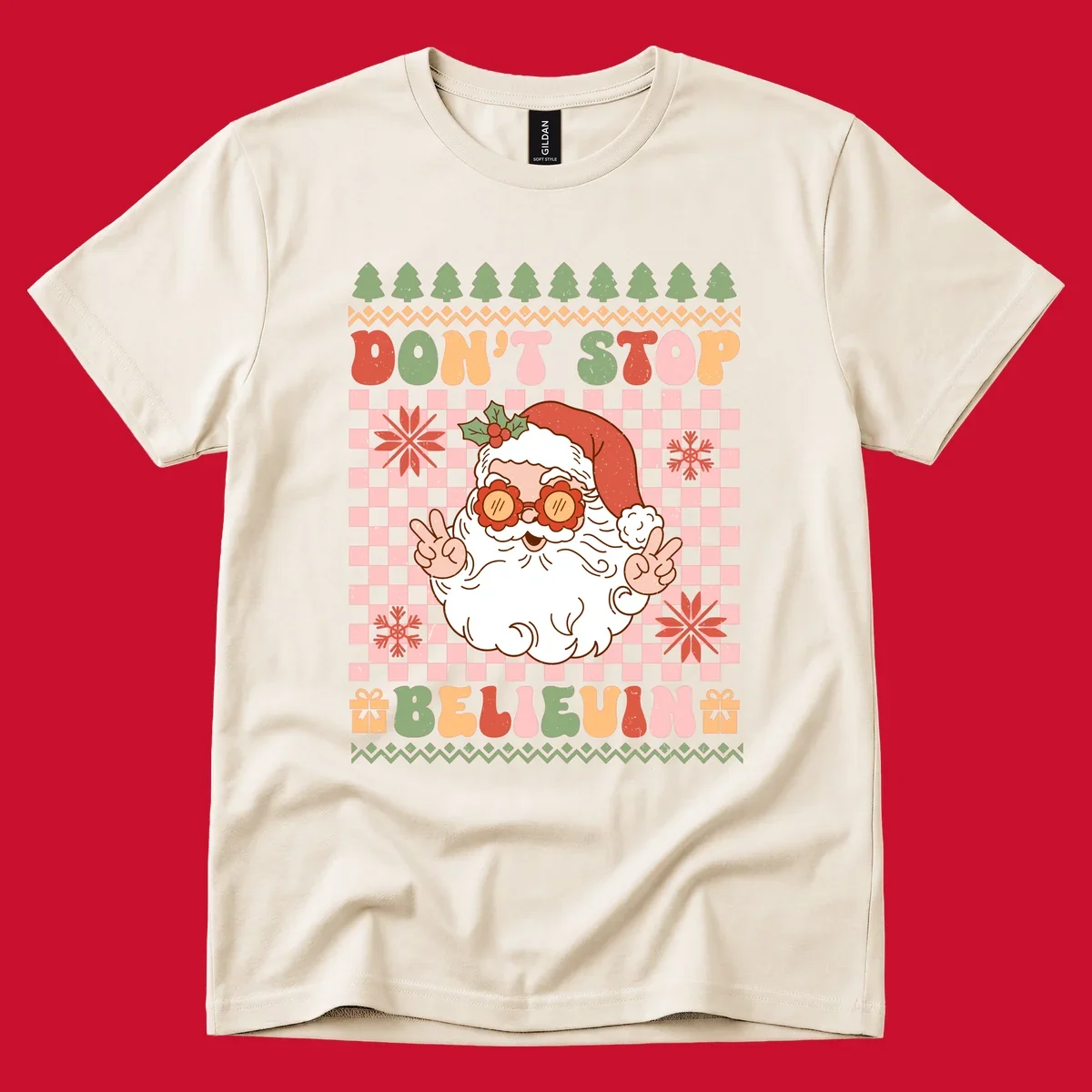 Retro Santa Claus with peace signs and sunglasses, text 'DON'T STOP BELIEVIN''.