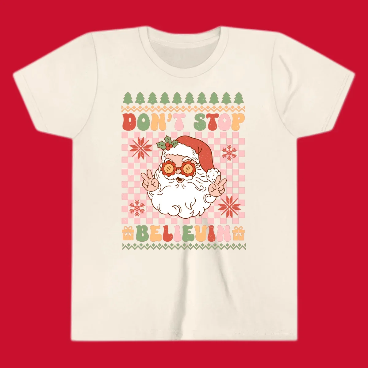 Retro Santa Claus with peace signs and sunglasses, text 'DON'T STOP BELIEVIN''.
